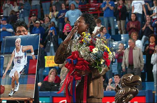 Washington documents upbringing, KU sports history in new book